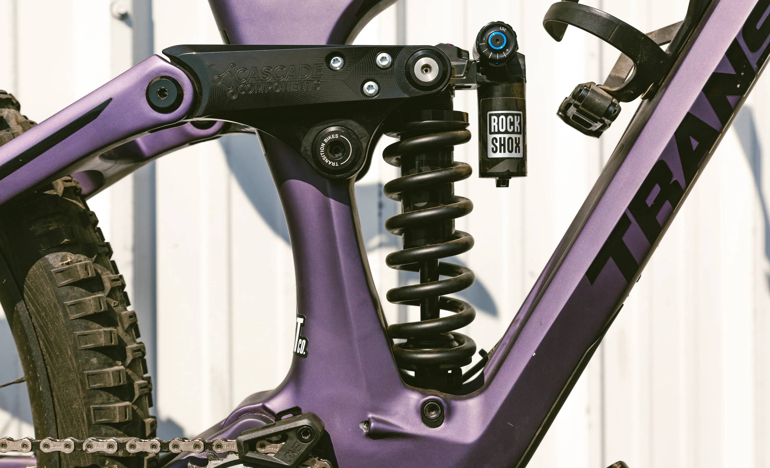 a rockshox super deluxe ultimate coil rear mountain bike shock with a cascade link