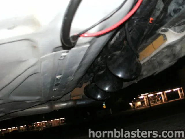 Wide shot of finished Conductor's Special 228H train horn kit install on Derek's 1996 Lincoln Town Car HornBlasters gallery photo 5