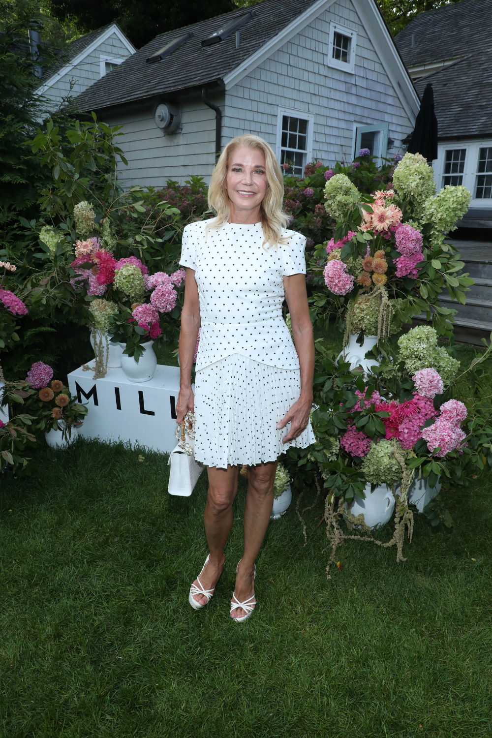 Candice Bushnell wears the Haddy Short Sleeve Dress at MILLY x The Daily Front Row's Maidstone Hamptons Cocktail Party.