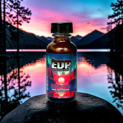 Bottle of EDP in front of a scenic sunset and mountains.