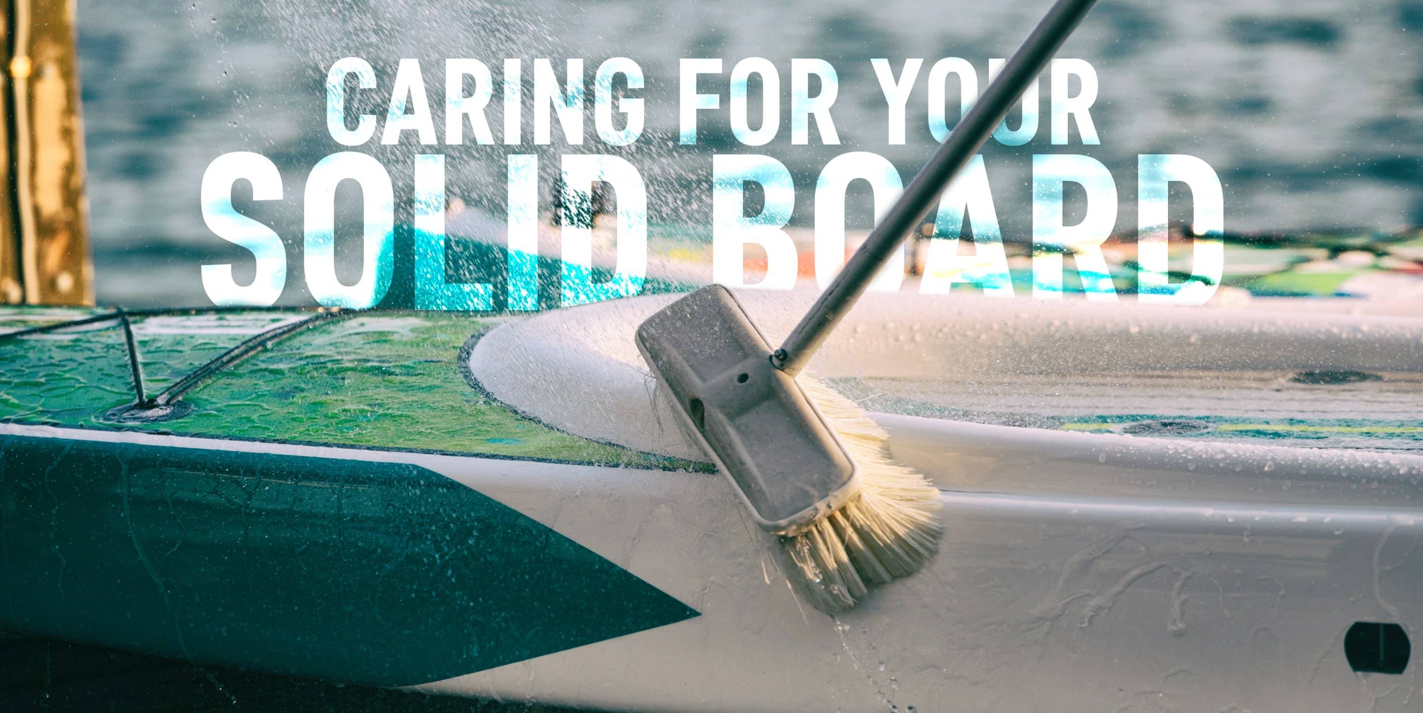 BOTE paddle board being washed with a brush