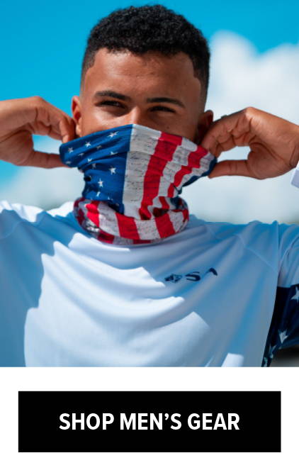 Shop Men's Gear. A man wearing a performance shirt with an American flag face shield over his face.