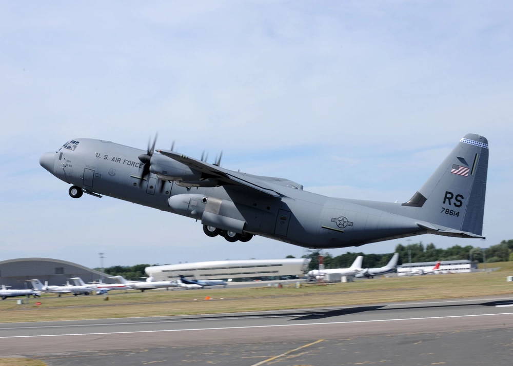 A C-130J Super Hercules takes off from the Farnborough Aerodrome runway, July 19. The aircraft is from Ramstein Air Base, Germany, and is being piloted by Lockheed Martin.