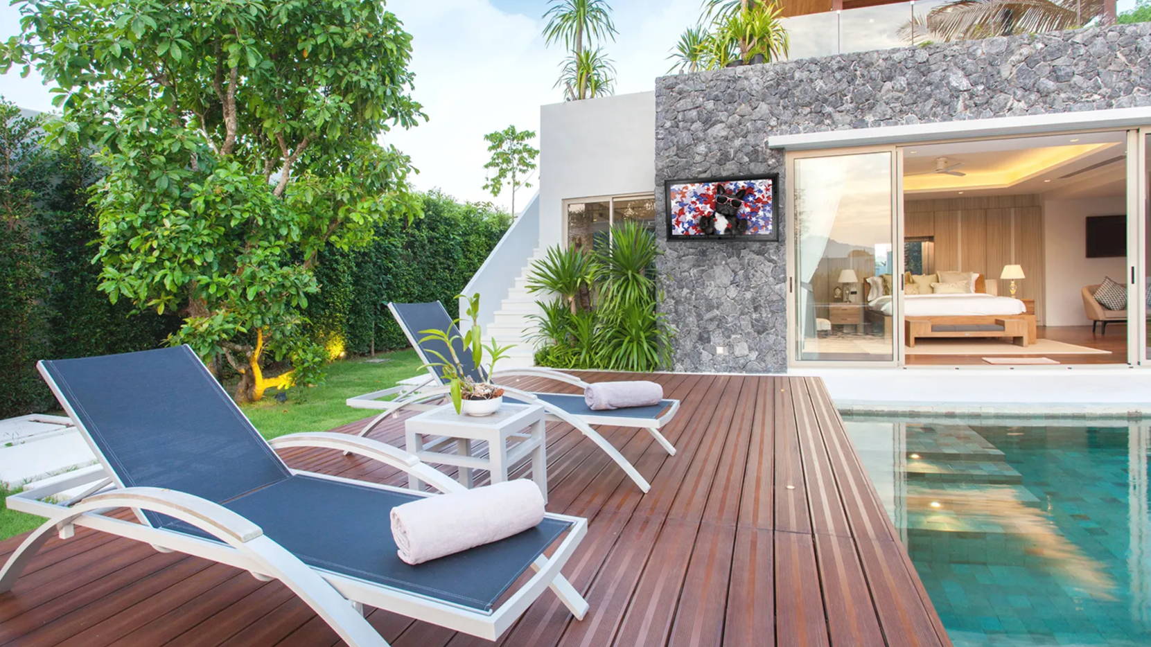 Outdoor TV by pool for rain, storm, theft, bug defense and more