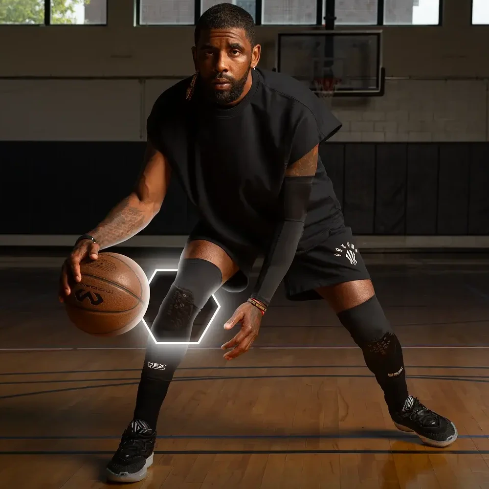Kyrie Irving dribbling a basketball on a court.