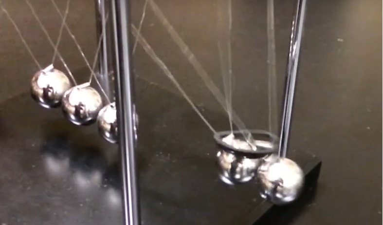 Figure 4: Perhaps the Newton's cradle demonstration has more to say about energy than it does about momentum.