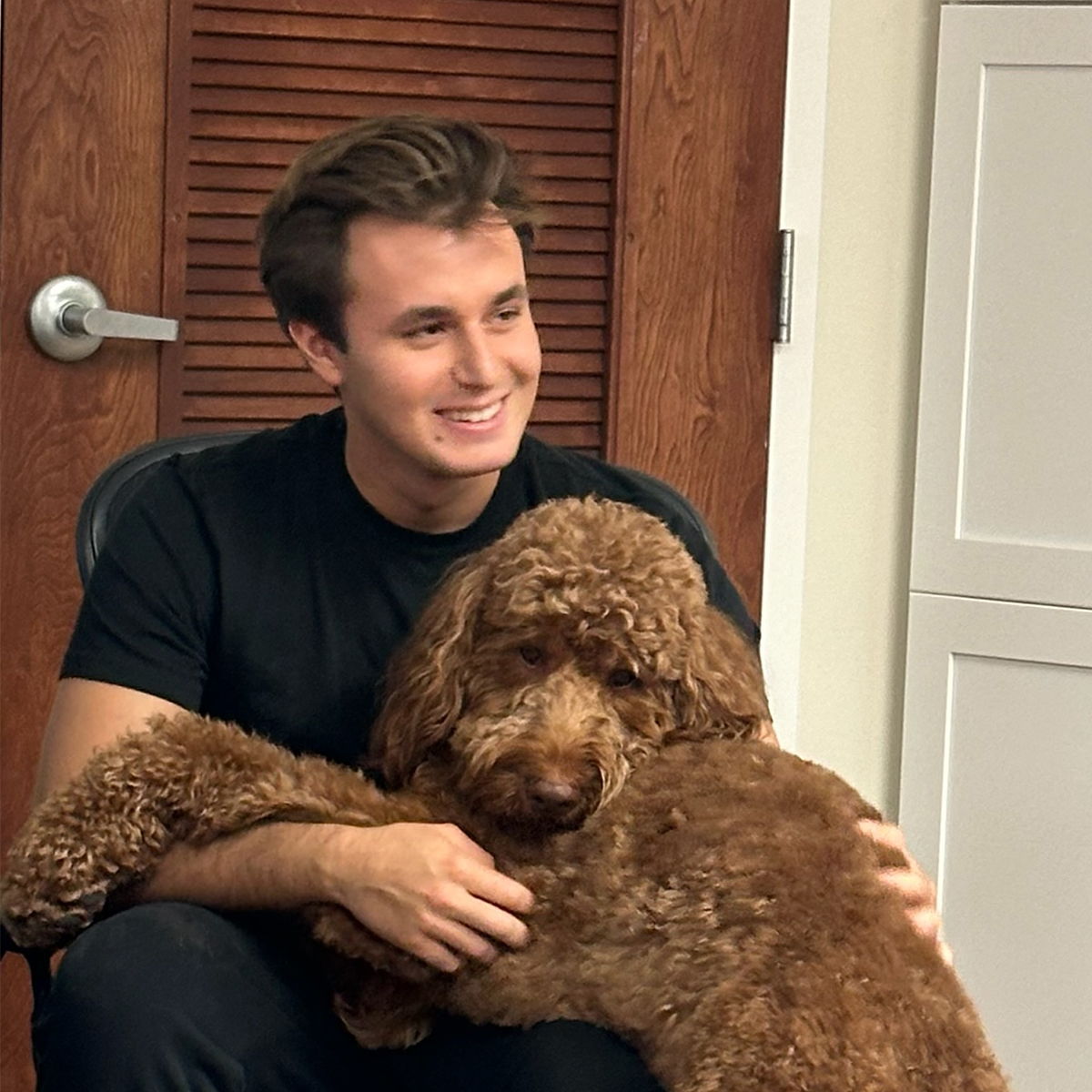 Scent Fill employee with dog