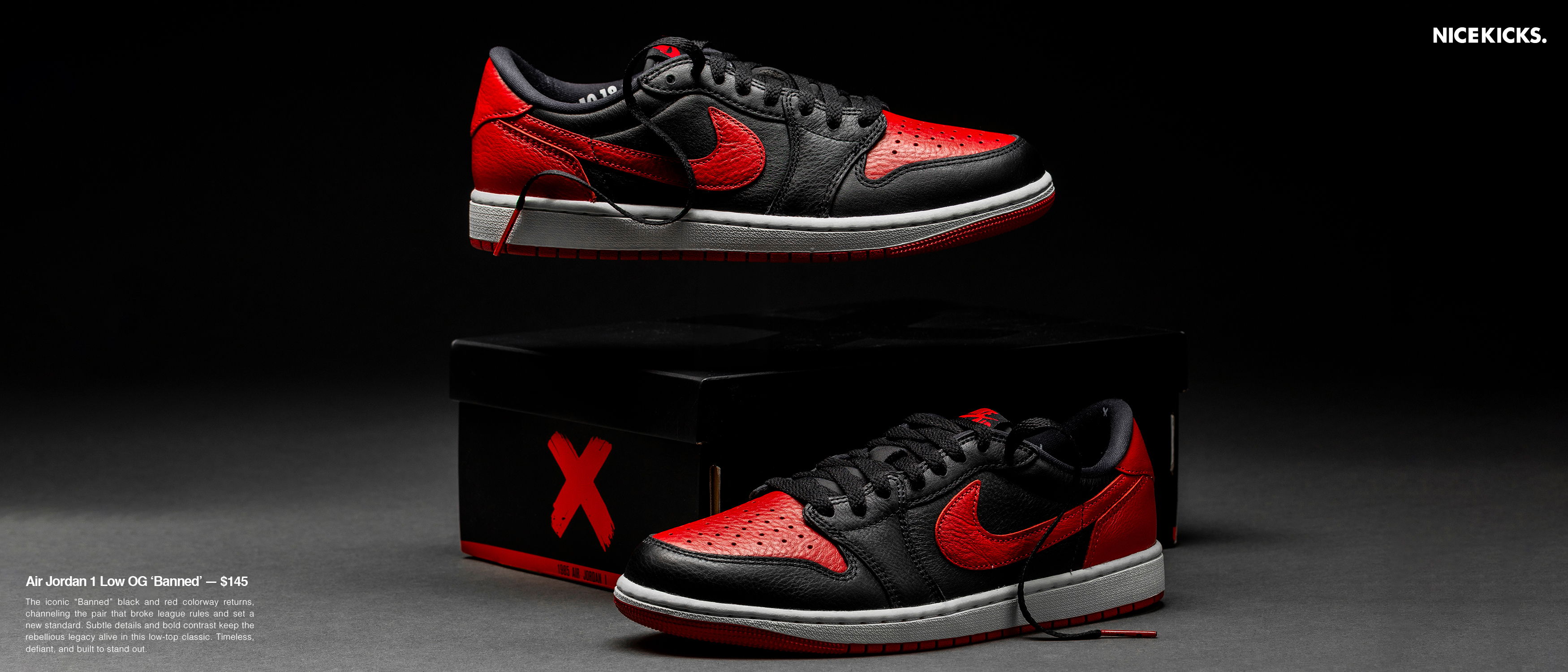 Red and black Nike sneakers on a display box.