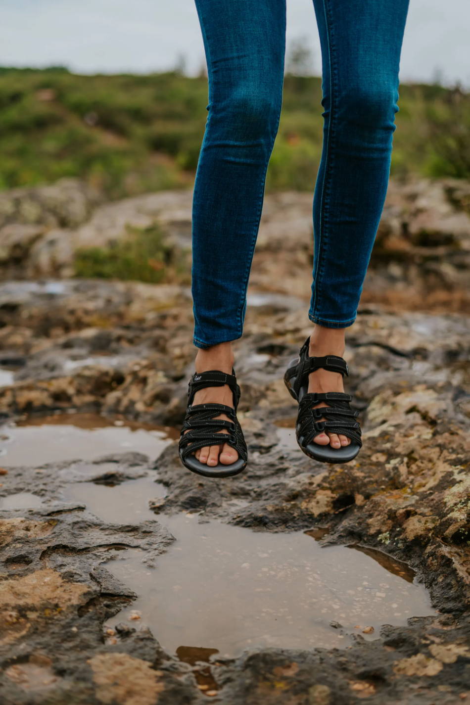 women wearing  sports sandals while outside