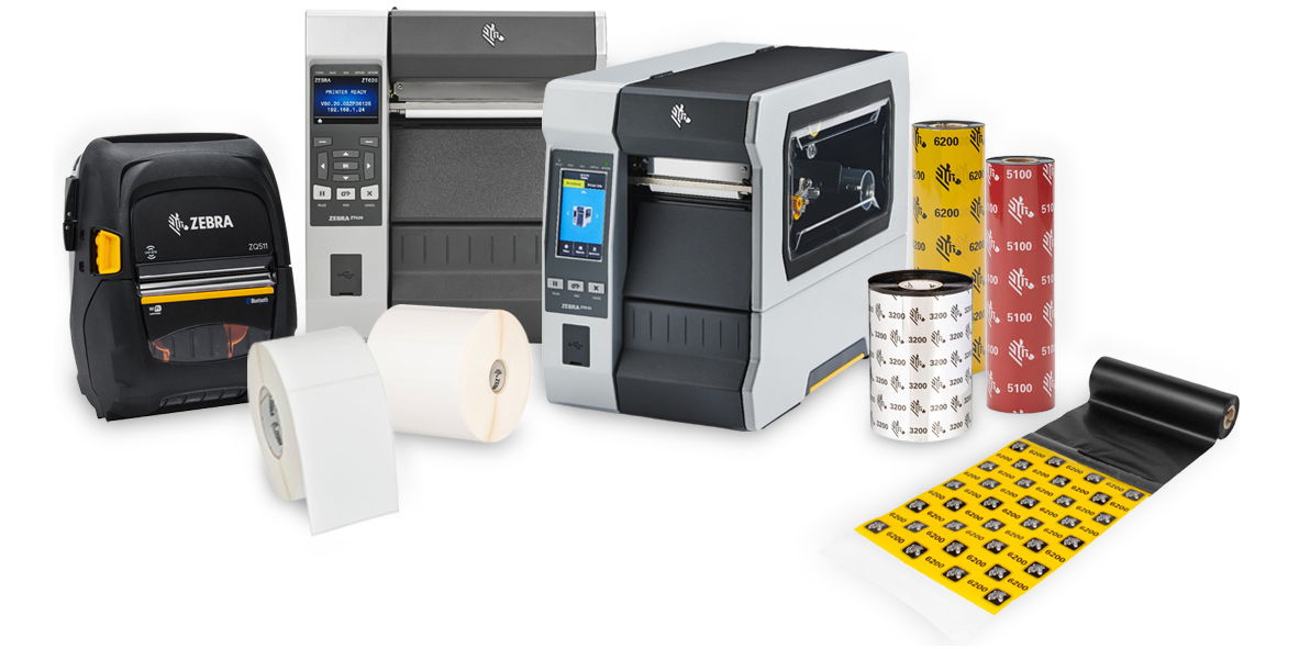 Various label printers and rolls of labels on a white background.