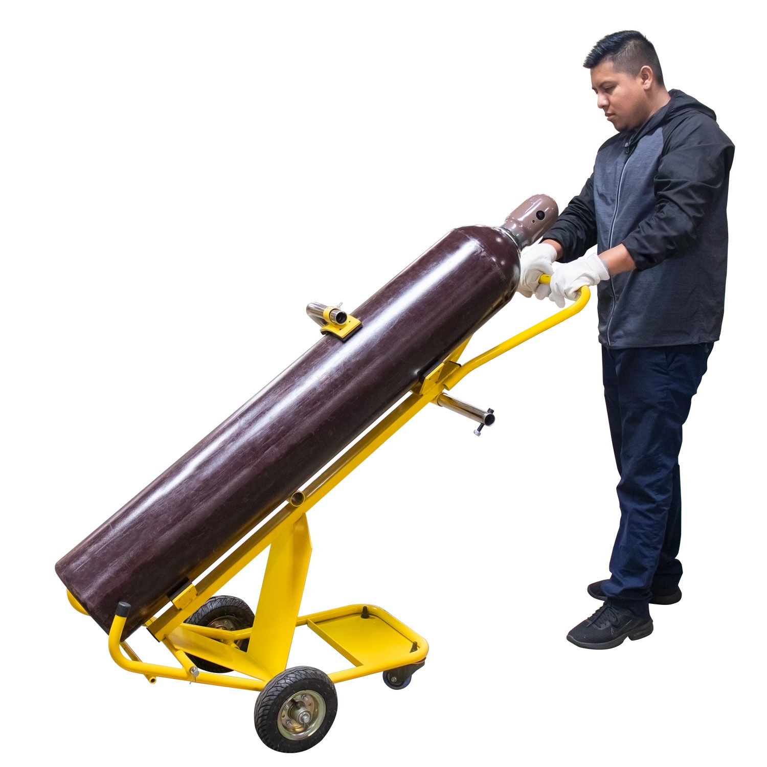 Man using a cart to transport a large gas cylinder.