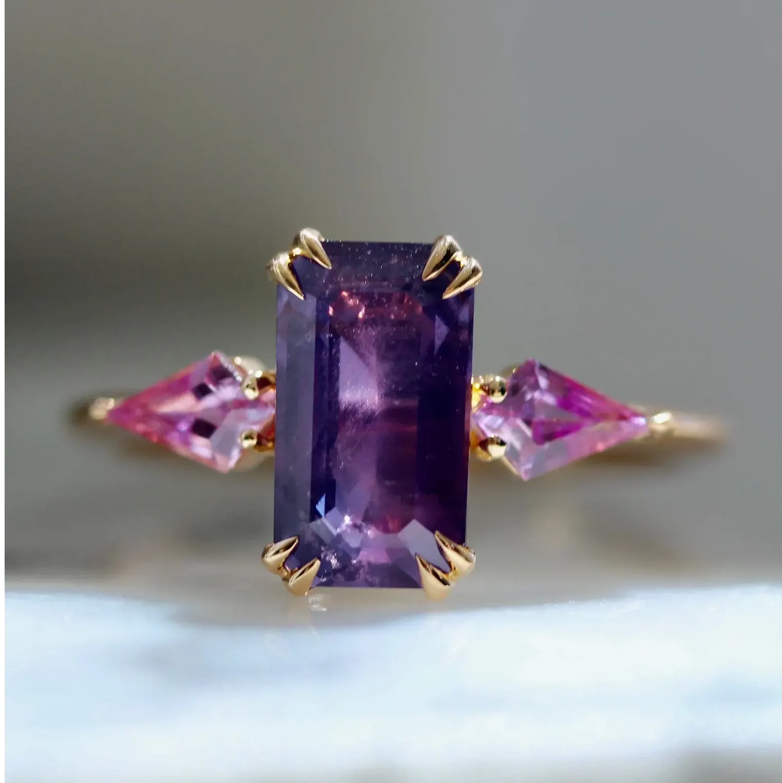Purple Emerald Cut Sapphire Ring with Pink Diamond Sides