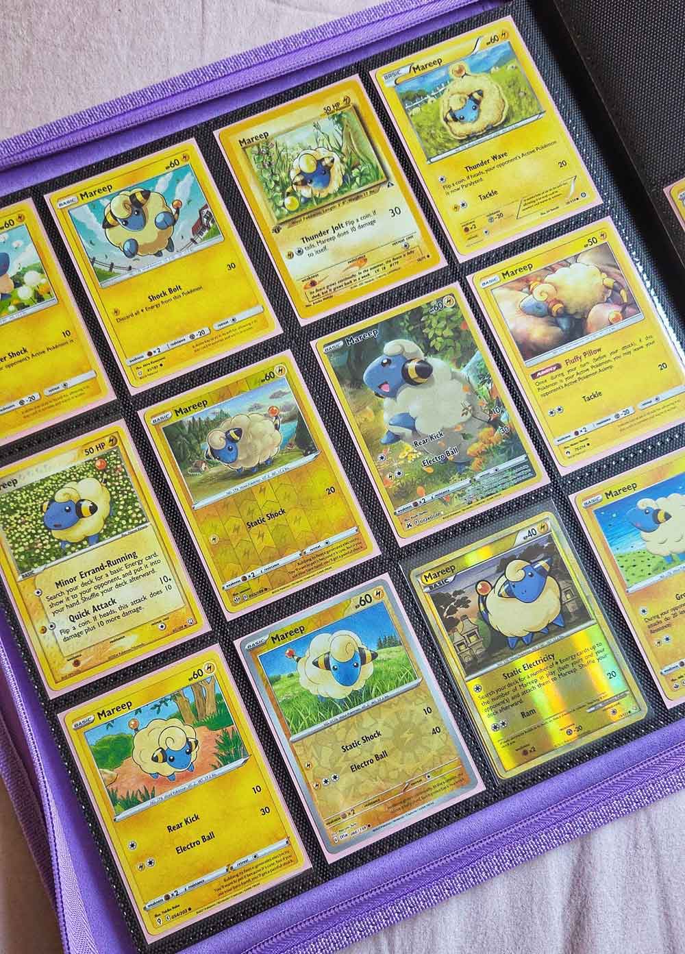 A collection of Pokémon cards featuring yellow-themed designs and illustrations.