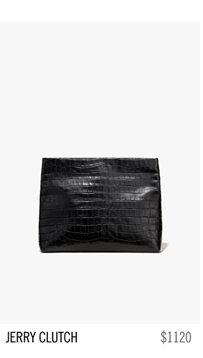 Black crocodile-embossed clutch bag labeled 