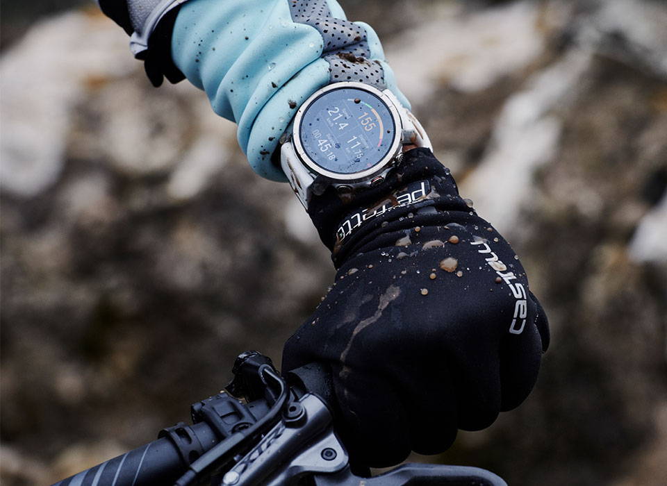 Cyclist wearing the Polar Grit X premium outdoor watch 