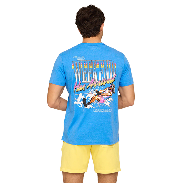 Person wearing a blue graphic t-shirt and yellow shorts, viewed from behind.