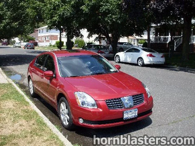Front-three-quarter Frank's 2002 Nissan Maxima sedan exterior grille headlights bumper Nathan AirChime K3 train horn featured customer install photo 1