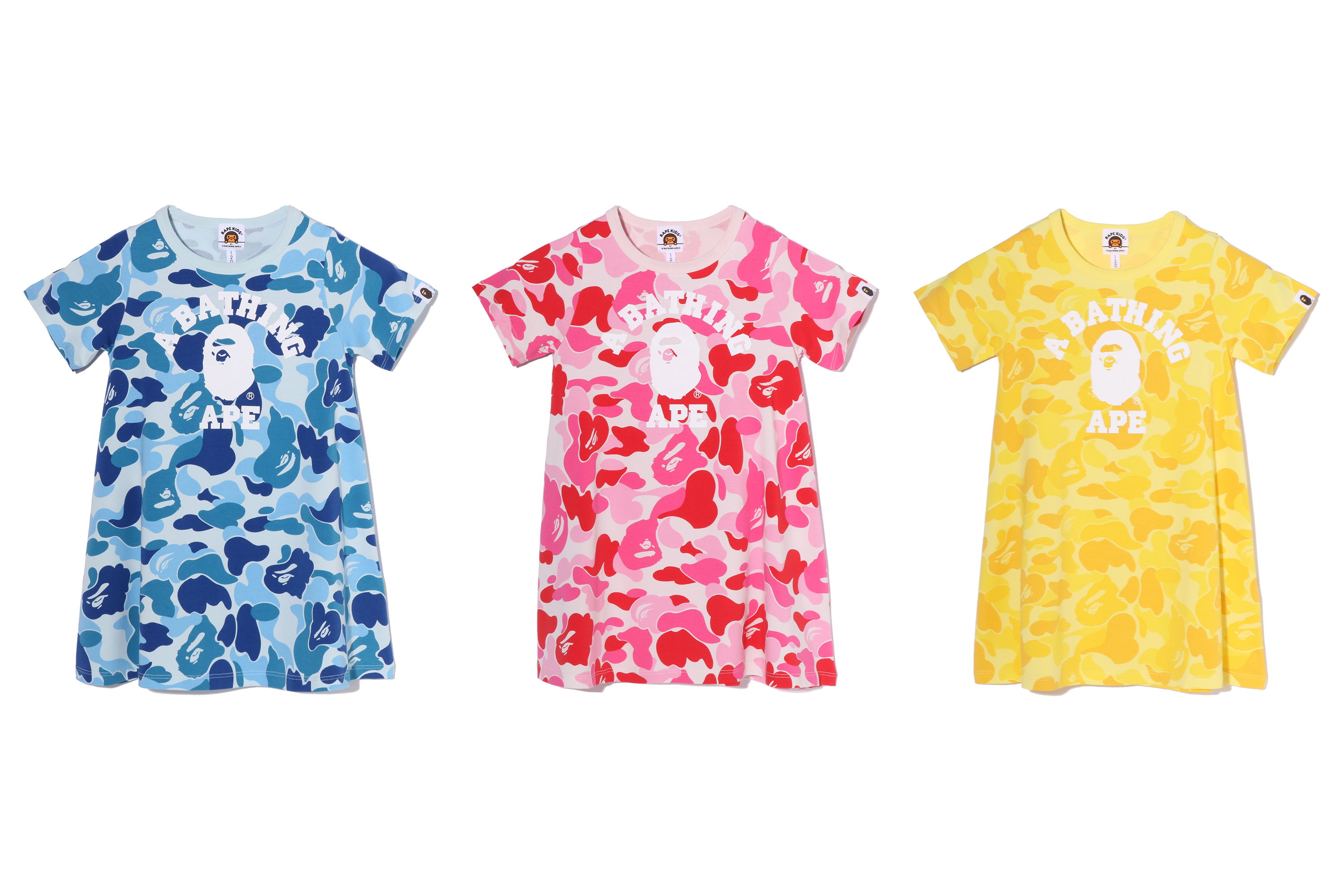 Three colorful dresses in blue, pink, and yellow with floral patterns.