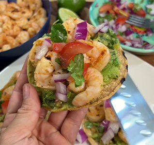Shrimp and avocado topped with pico de gallo and cilantro. View this post on Tastefully Simple's Instagram.