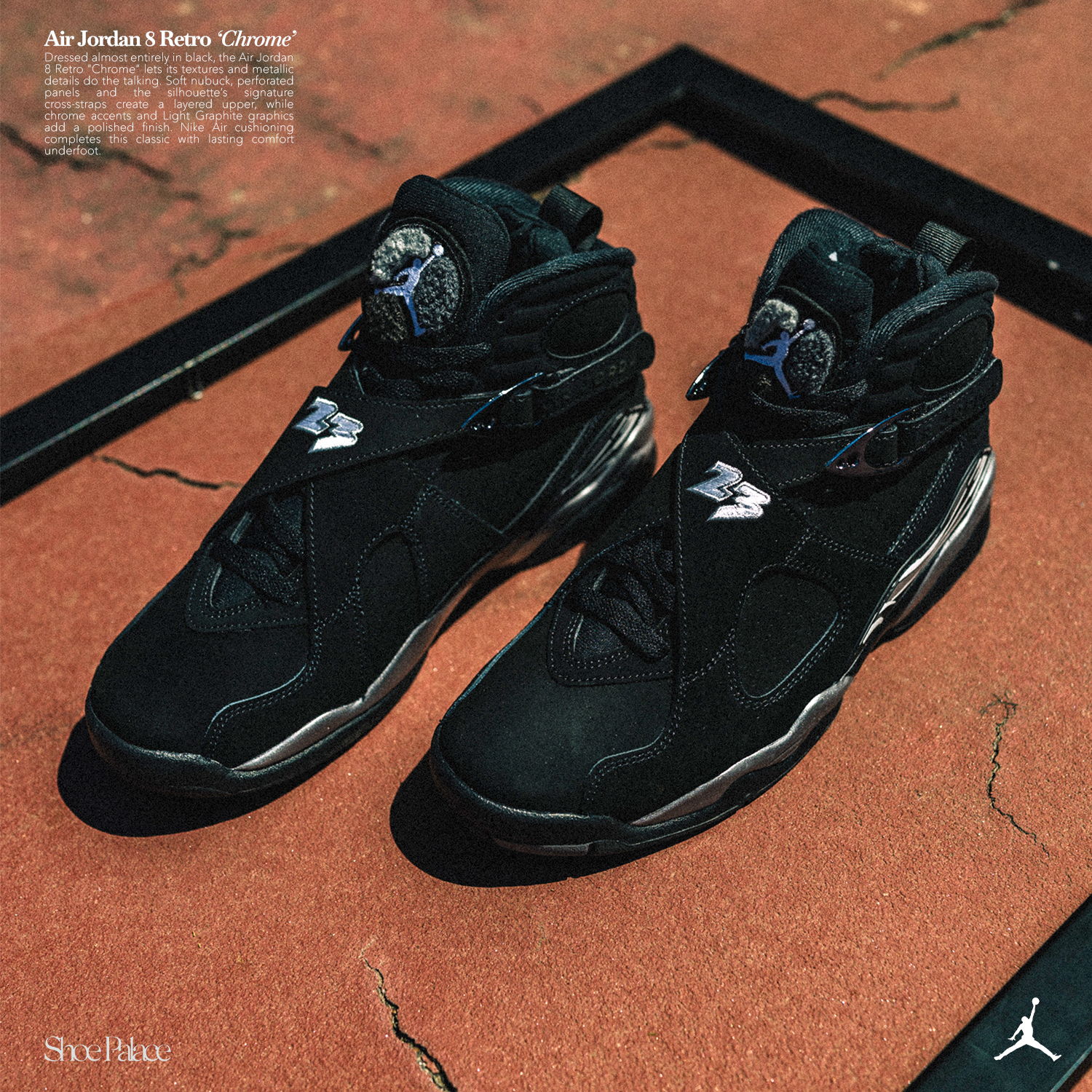 A pair of black Air Jordan sneakers on a surface.