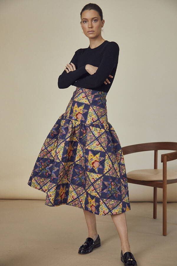 A look book image of a model wearing the Hunter Bell Remy Skirt Wales Quilt.