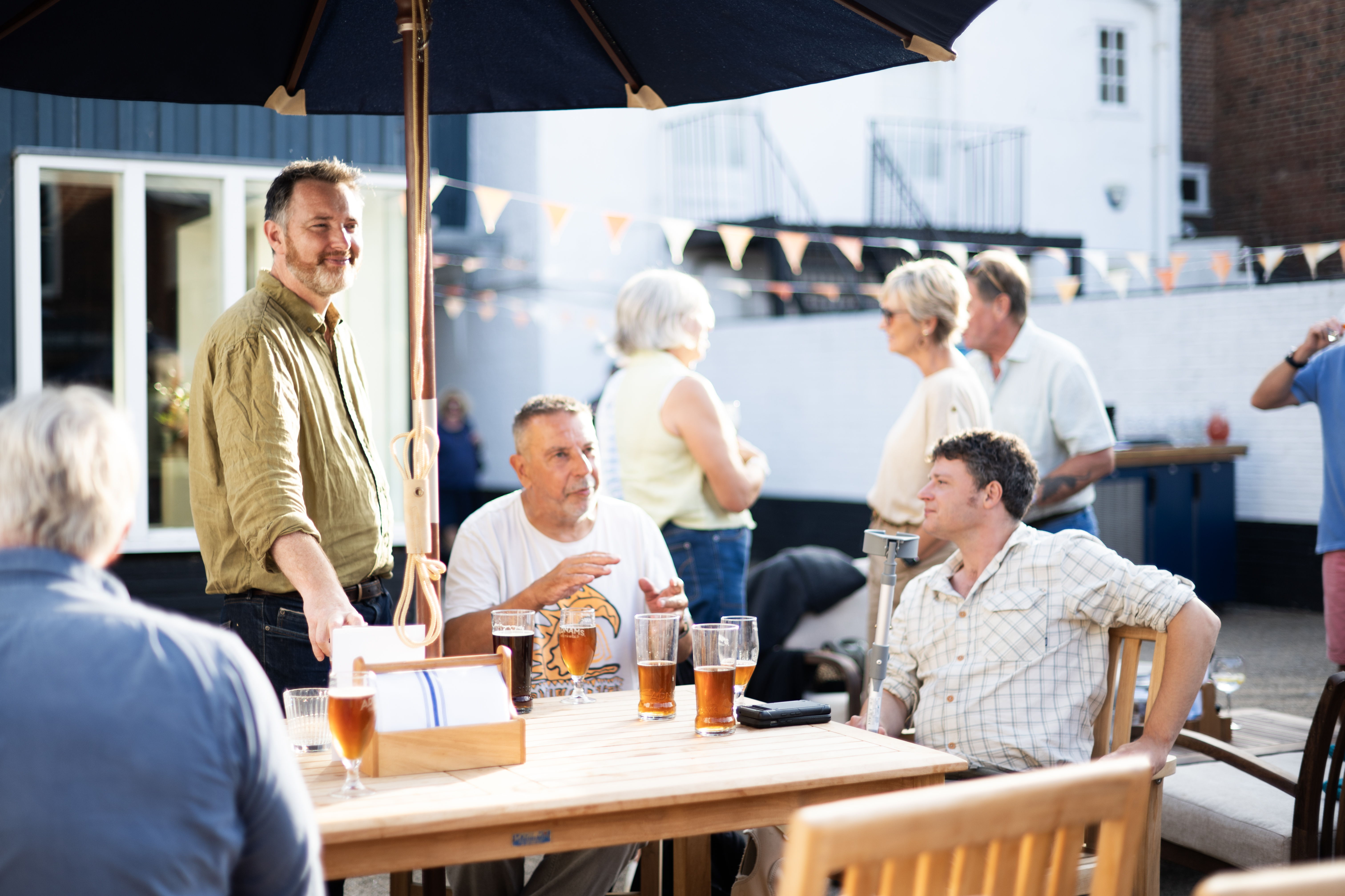 Fergus, Adrian and Dan enjoying the first taste of Extra at The Swan's Courtyard Session: An Extra Special Beer BBQ