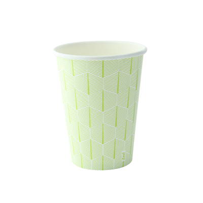 A green paper cup with a leaf pattern