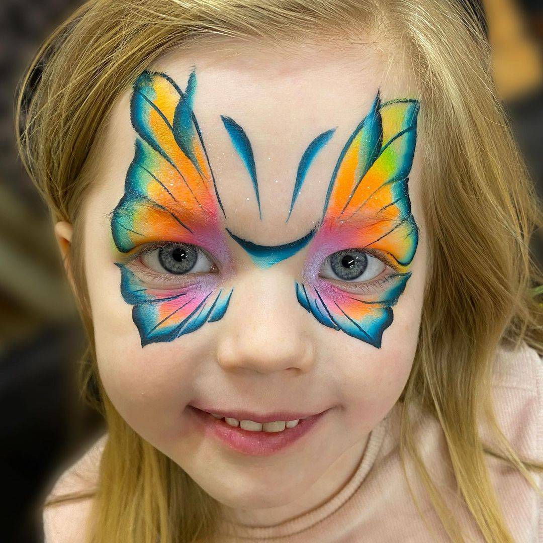 rainbow butterfly face paint mask young girl