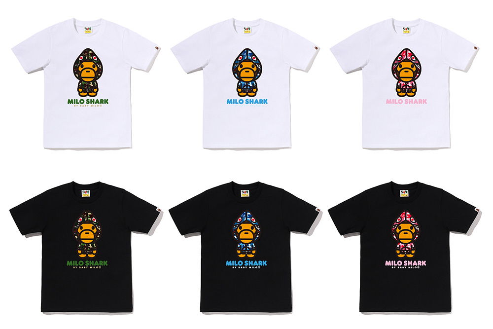 Six t-shirts featuring colorful cartoon designs, three white and three black.