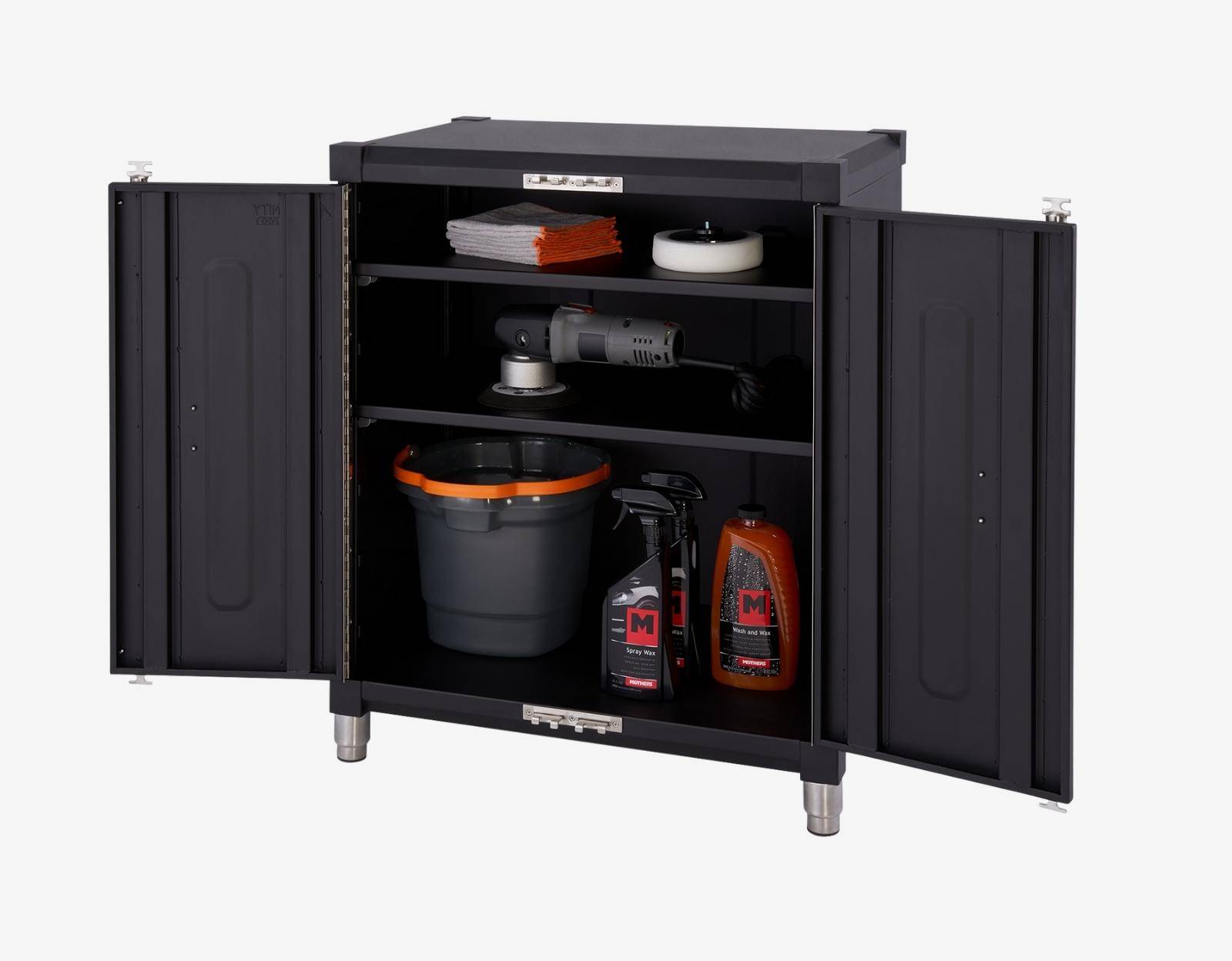 base cabinet open filled with car cleaning products