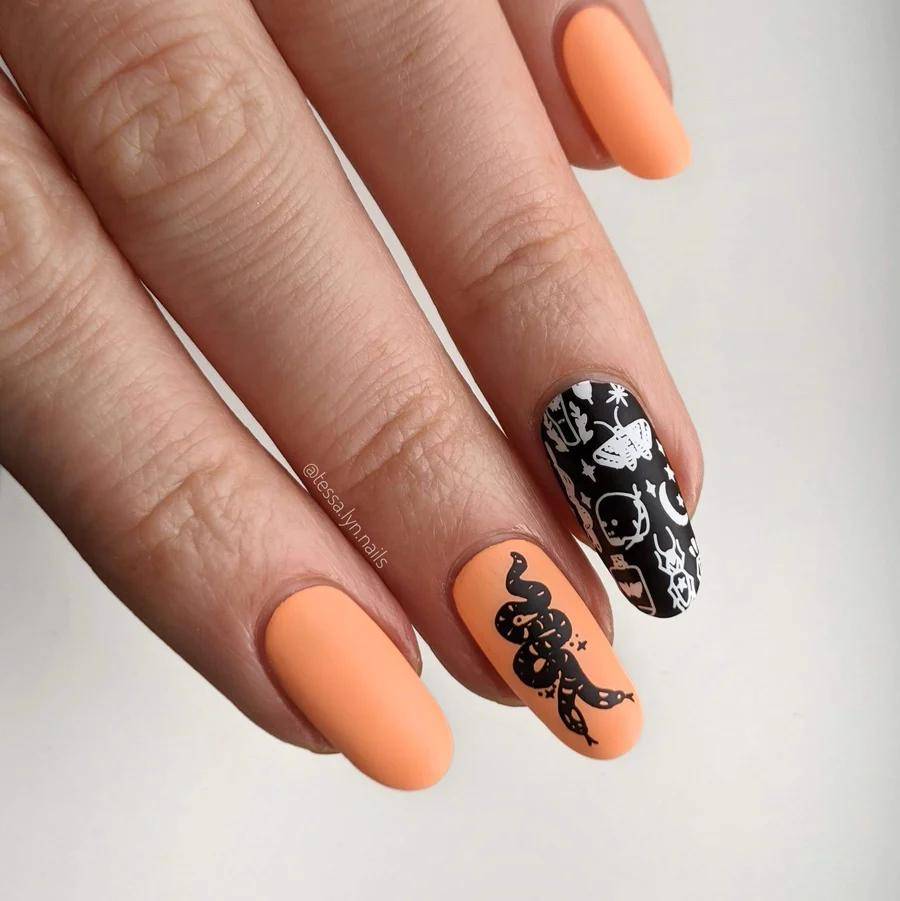 Intricate manicure made easy with nail stamping halloween nails