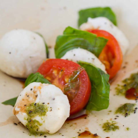 Mozzarella and tomatoes in a row