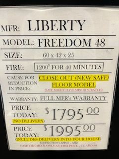 LIBERTY FREEDOM 48 BROWNING GRAND 33 gun safe exterior with sale price tag on door - SES spring cleaning sale