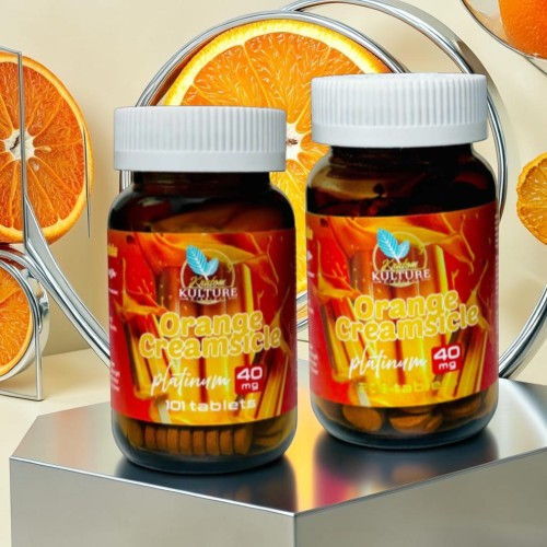 Two bottles of dietary supplements with orange background.