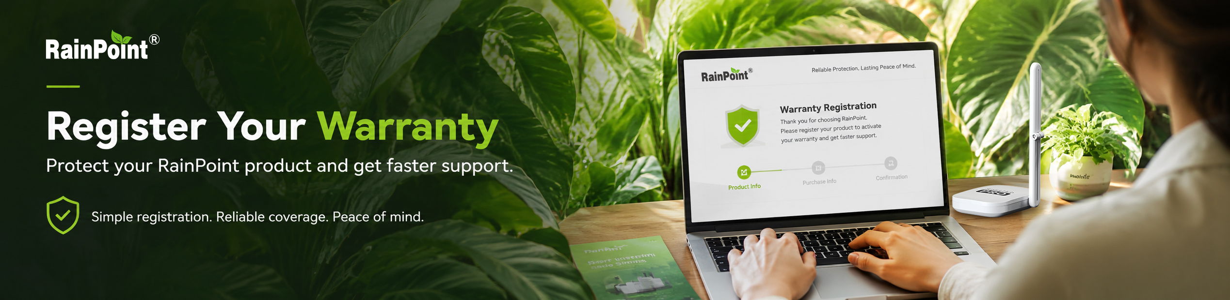 Person registering a warranty on a laptop surrounded by greenery.