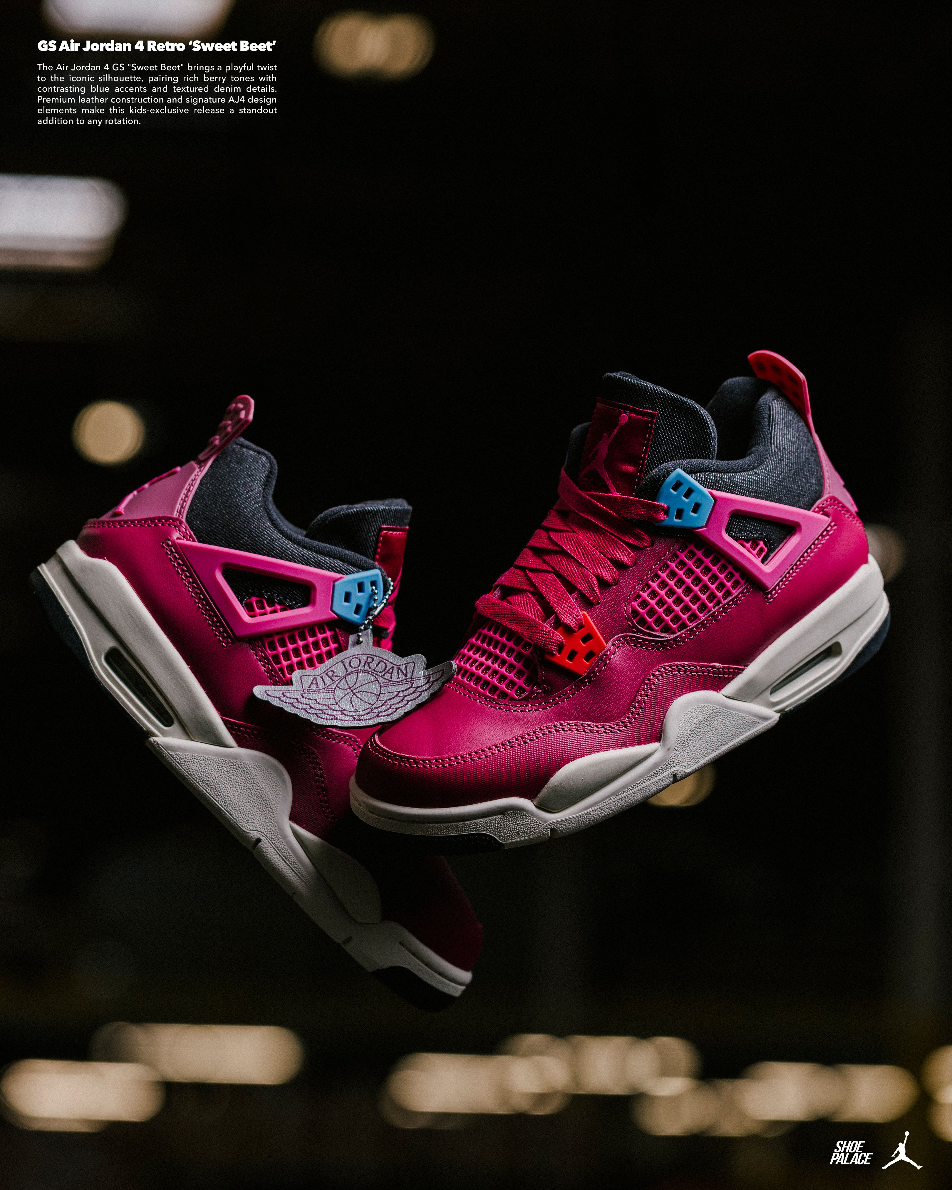 Pink and black Air Jordan 4 sneakers displayed in mid-air.