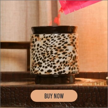 Leopard print candle holder with a 
