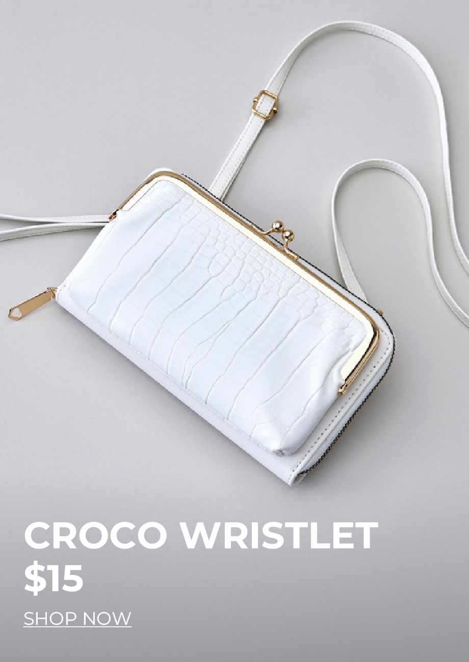 White croco wristlet with gold accents, priced at $15.