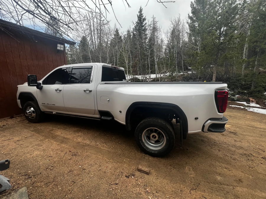 Rear truck bed spare tire delete well on Martin's 2023 GMC Sierra 3500 with HornBlasters Conductor's Special 244K kit and S6 horn upgrade layout, customer install gallery photo 1