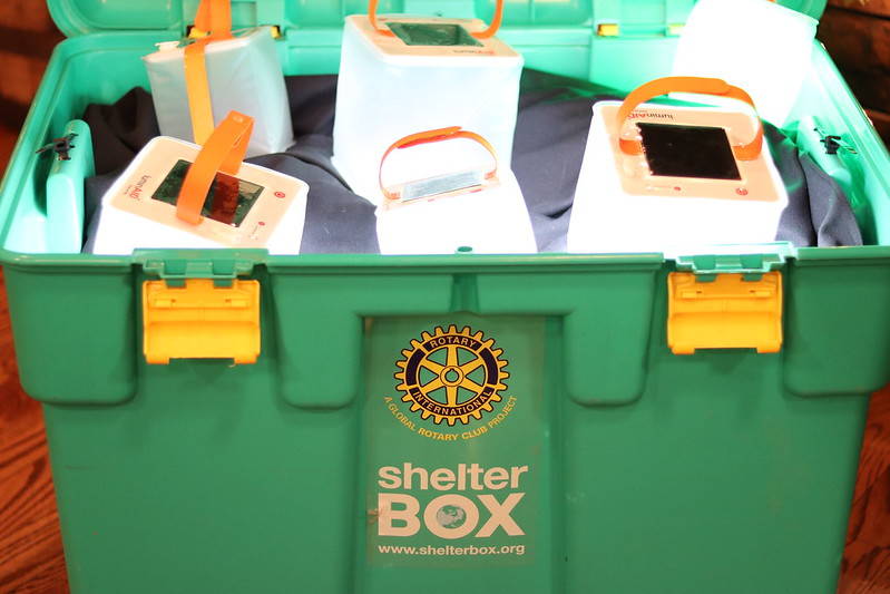 Shelter box and rotary club case of lights.