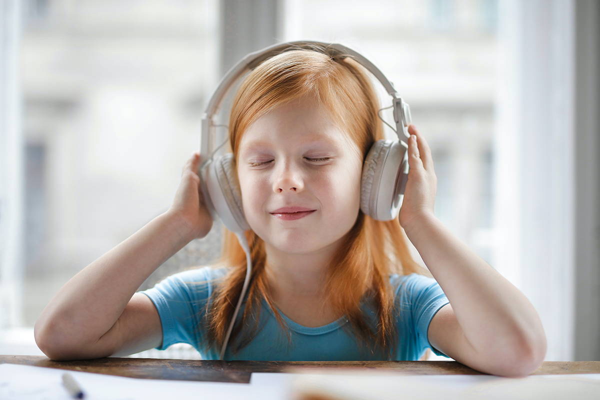 Girl listening to headphones