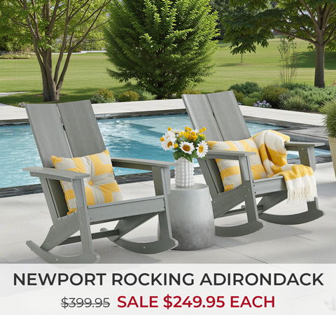 Two rocking chairs by a pool with flowers and sale price.