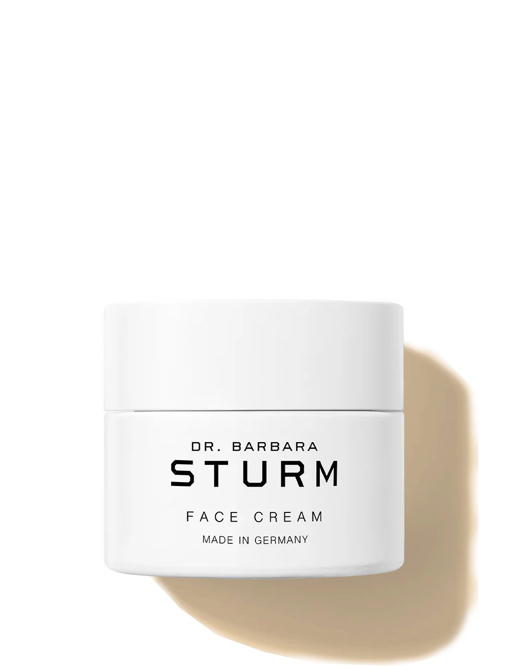 White jar of Dr. Barbara Sturm face cream, labeled 