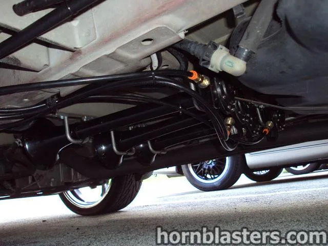Undercarriage four black Conductor's Special train horn trumpets brass fittings air lines exhaust pipe Leonard's Dodge Caravan 232 gallery photo 3