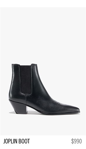 Black ankle boot with a pointed toe and stacked heel.