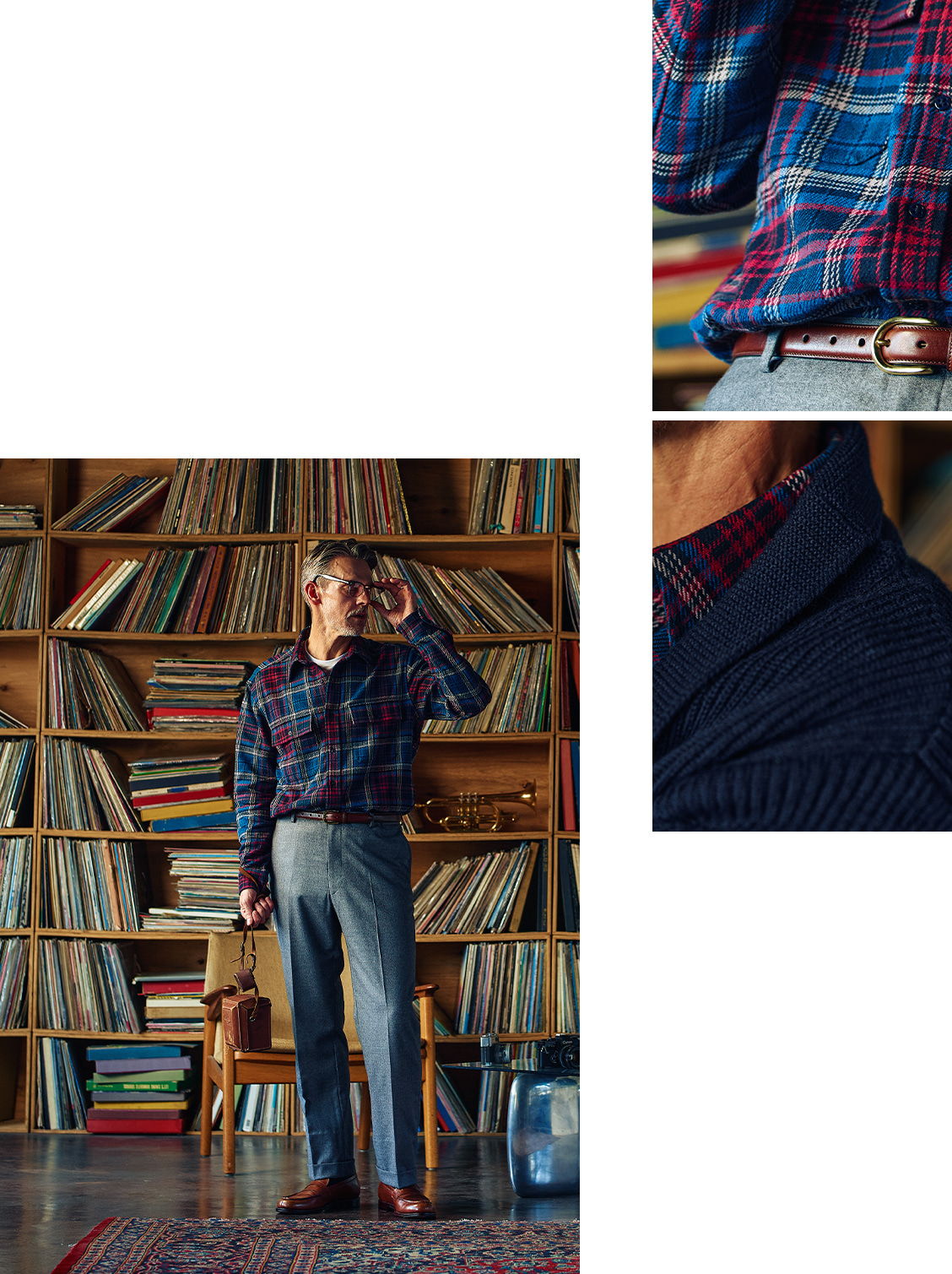 A person in a plaid shirt stands in a room filled with records.