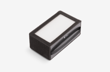 Black rectangular box with a white top surface.