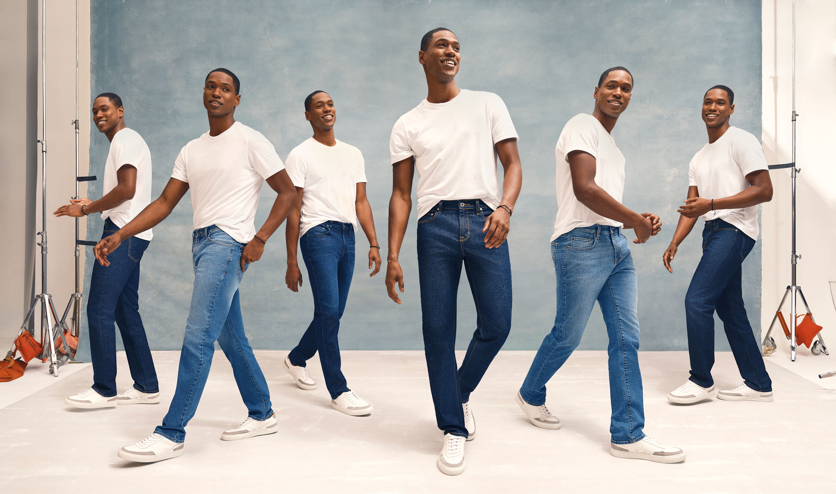 A person in multiple poses wearing a white shirt and jeans.