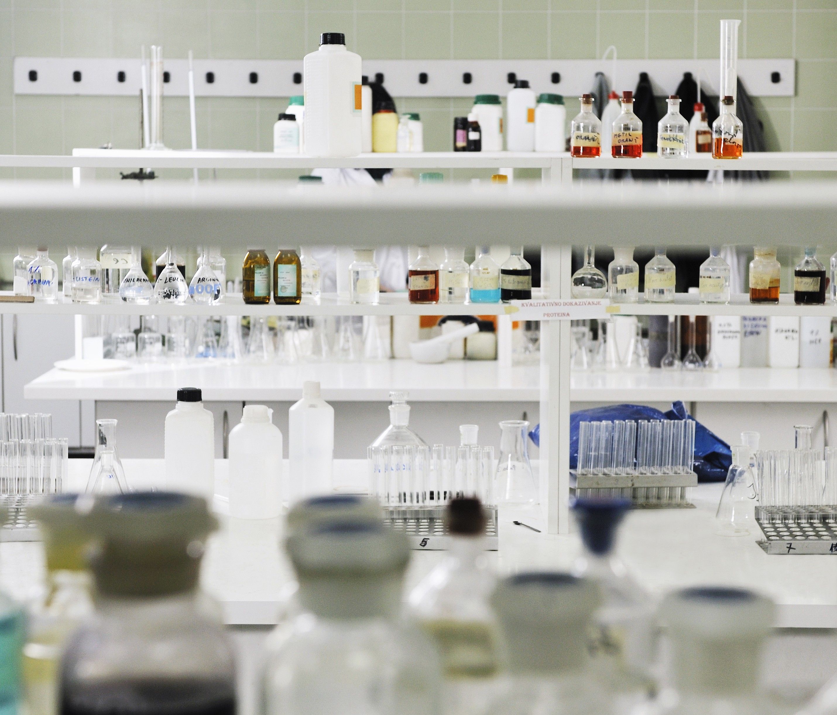 Lab reagents on shelves for custom manufacturing