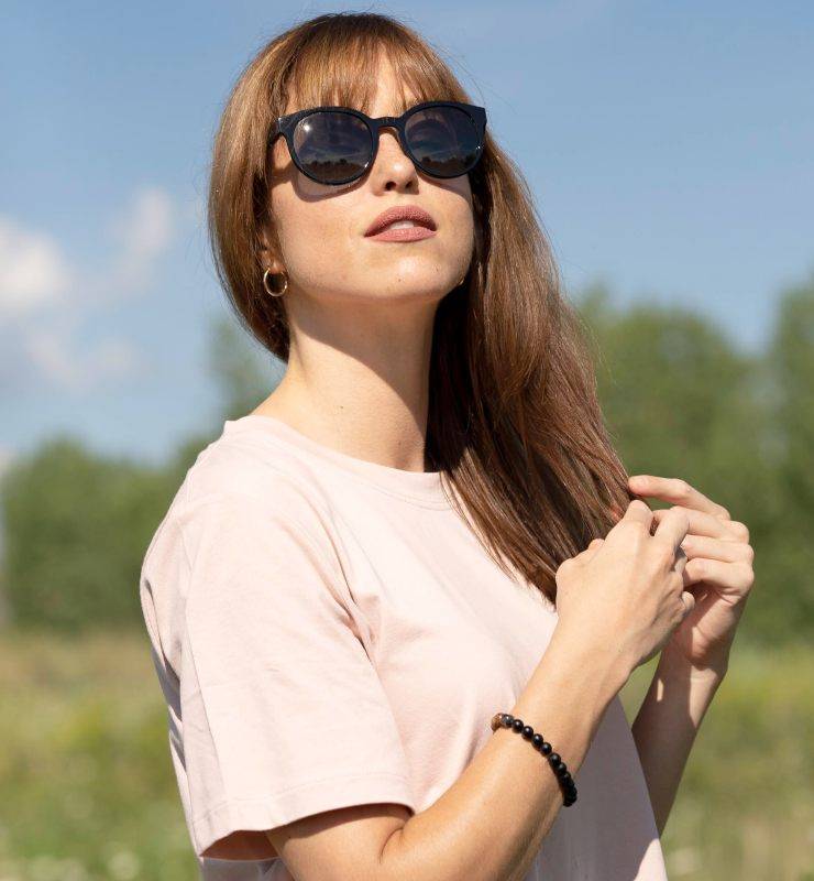 Woman with oblong face shape wearing Luxy, Round Wooden Sunglasses